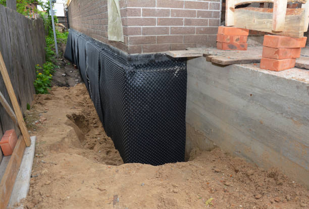 SJ Waterproofing Pros technician performing targeted Waterproofing assessment in Somerville, OH